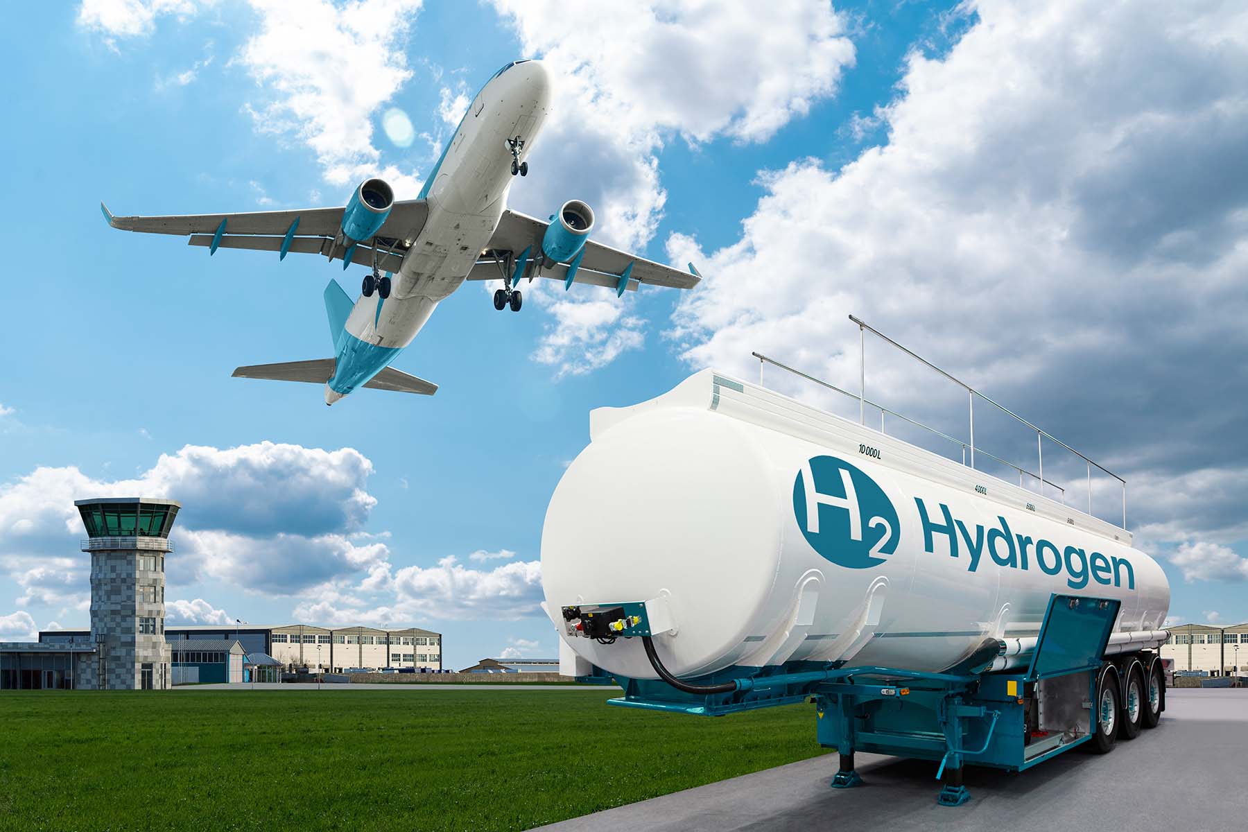 An aeroplane takes off with a hydrogen tanker in the foreground