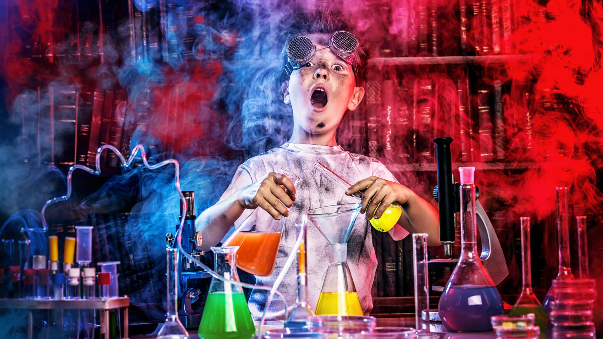 boy scientist pulling panic face