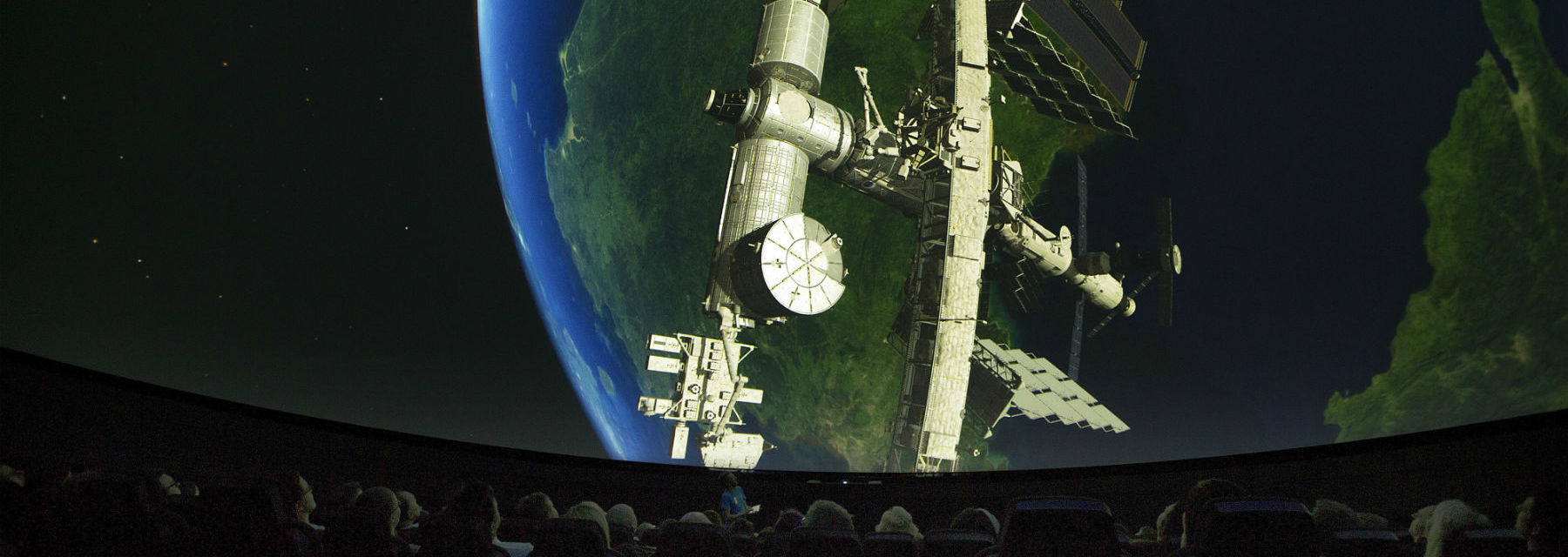 The International Space Station above the Earth as viewed from within the Planetarium at GSC