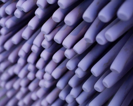 A close-up of a touch wall with lots of purple 'fingers'