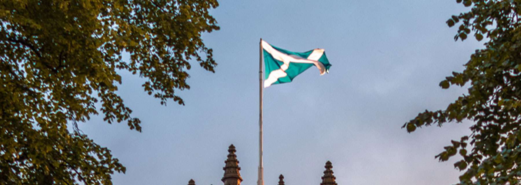 Medieval building with Scottish flag
