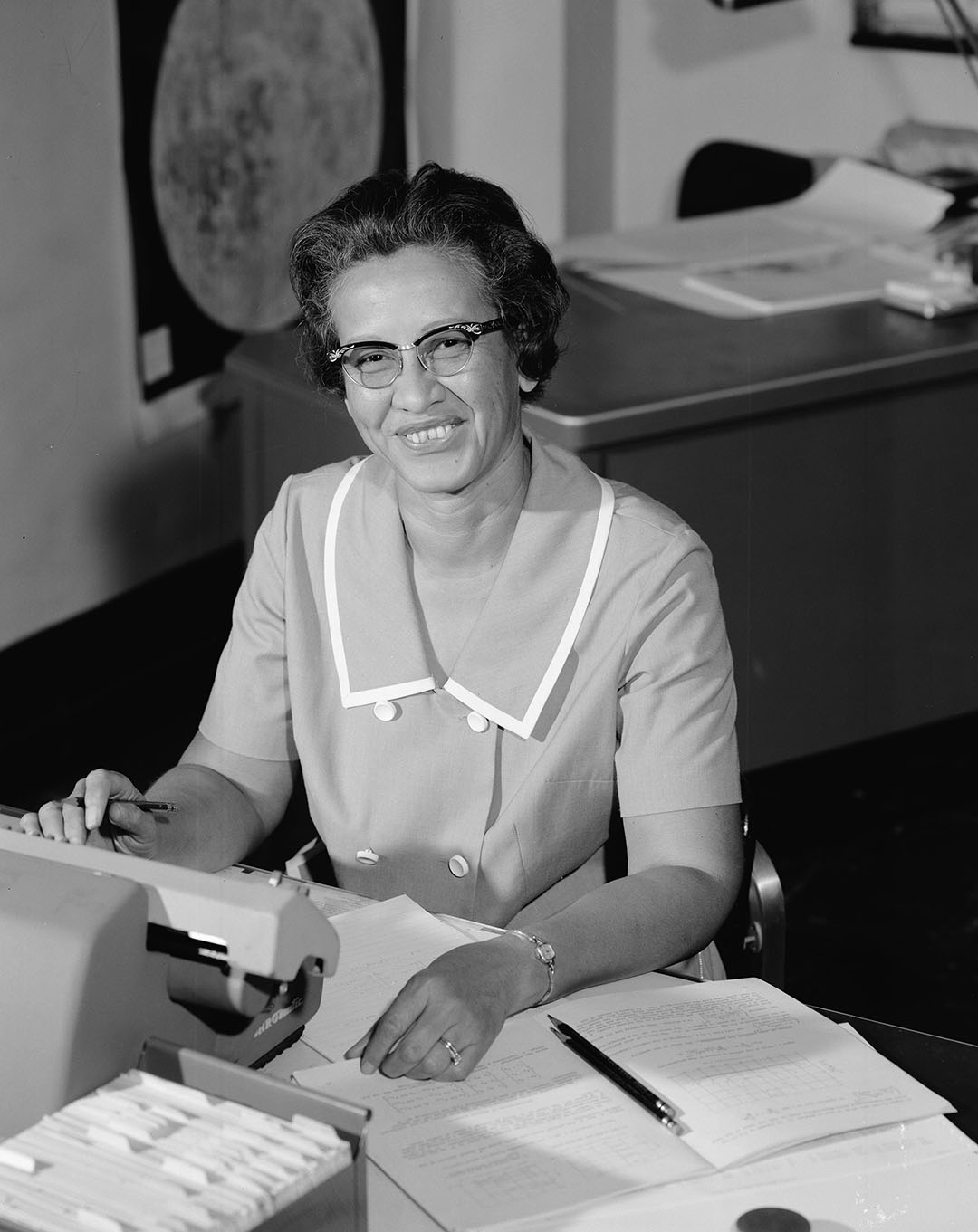 NASA research mathematician Katherine Johnson is photographed at her desk at Langley Research Center in 1966. Image credit: NASA