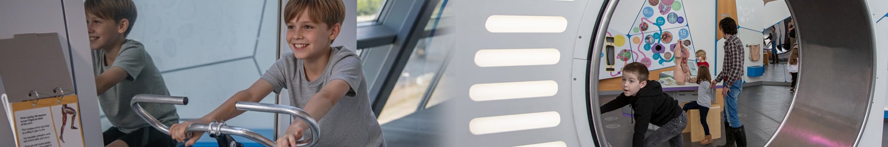 Two children interacting with BodyWorks exhibition exhibits