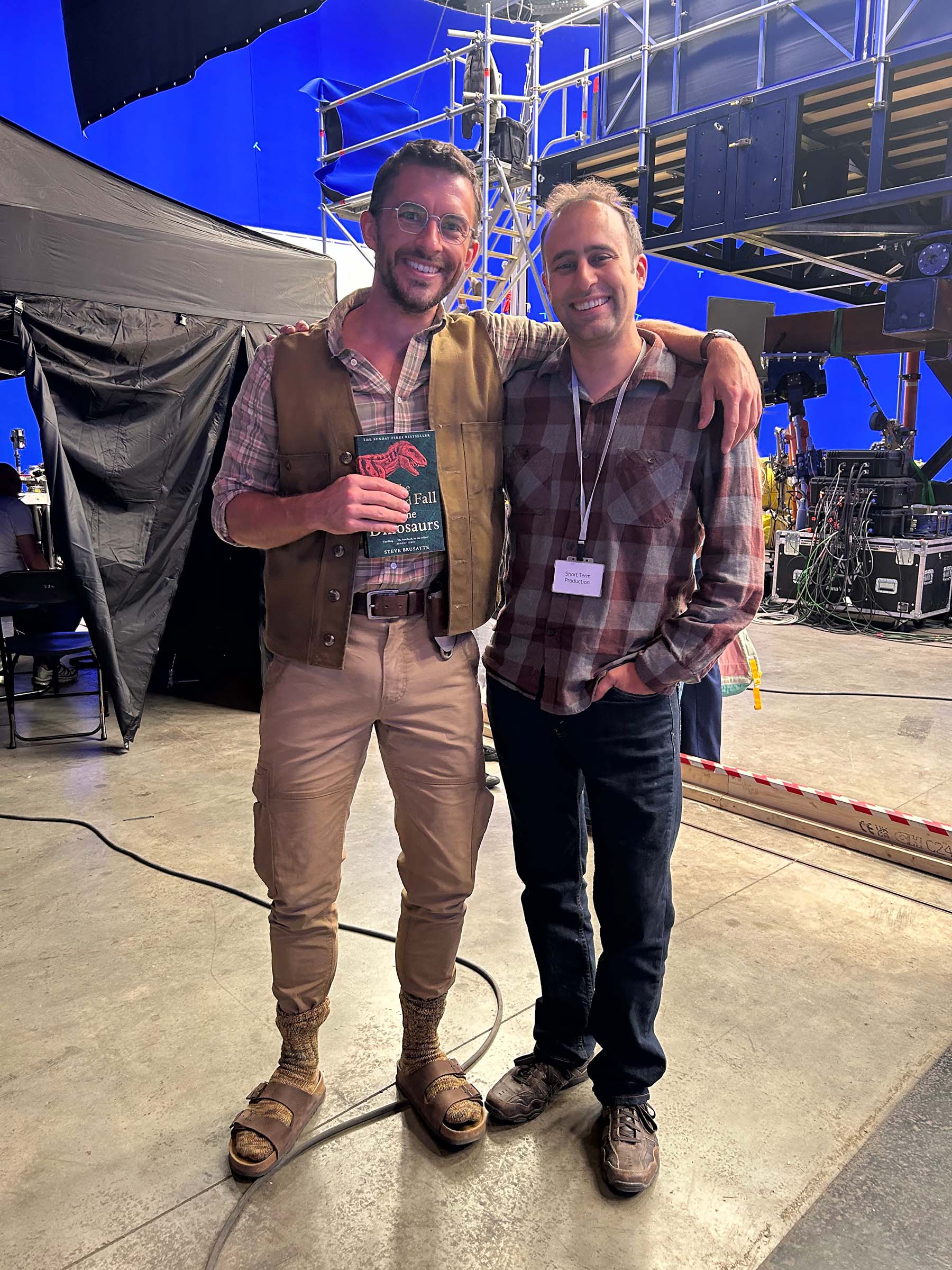 A photo of Dr Steve Brusatte (right) with Jonathan Bailey on set of Jurassic World Rebirth