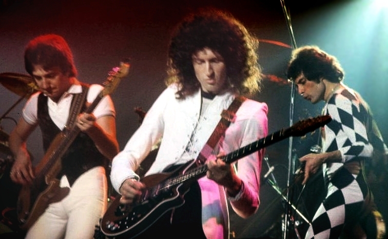 Queen performing on stage in 1977