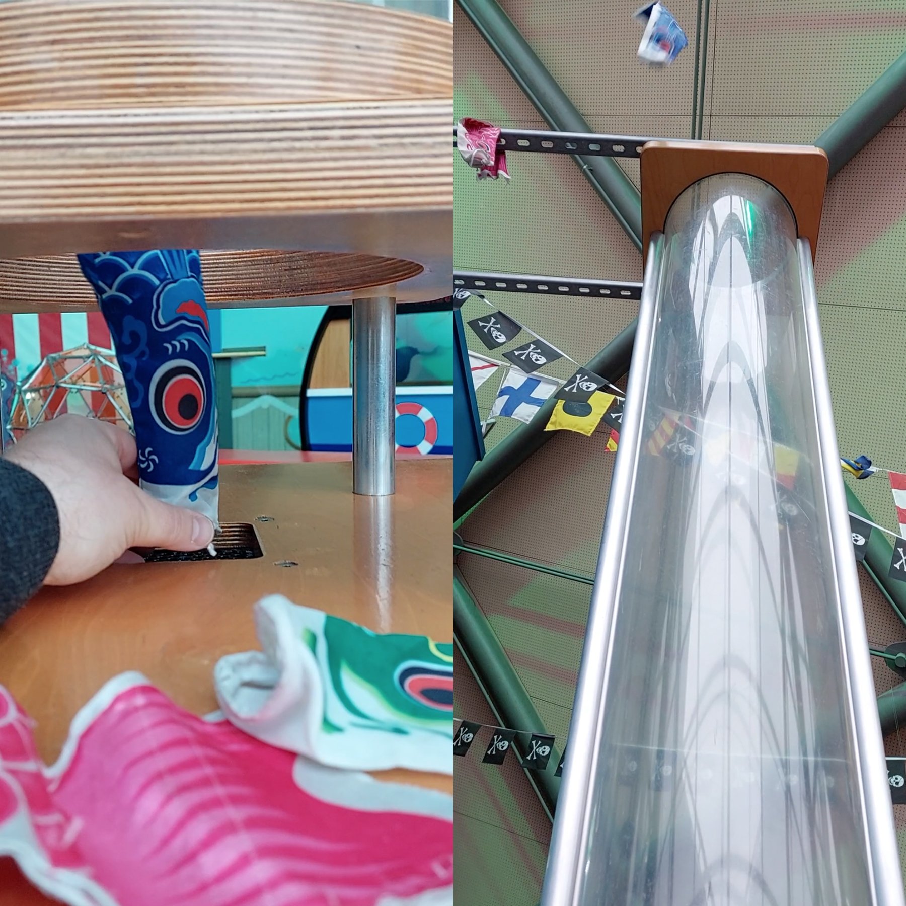A fabric fish is placed into the bottom of a Perspex pipe and then emerges out from the open top.