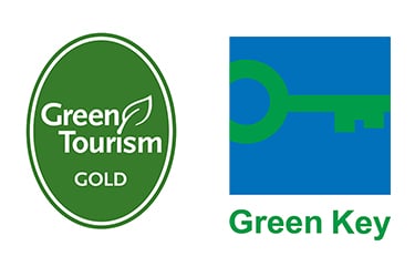 Left: Green Tourism Award Gold. Right: Green Key Award