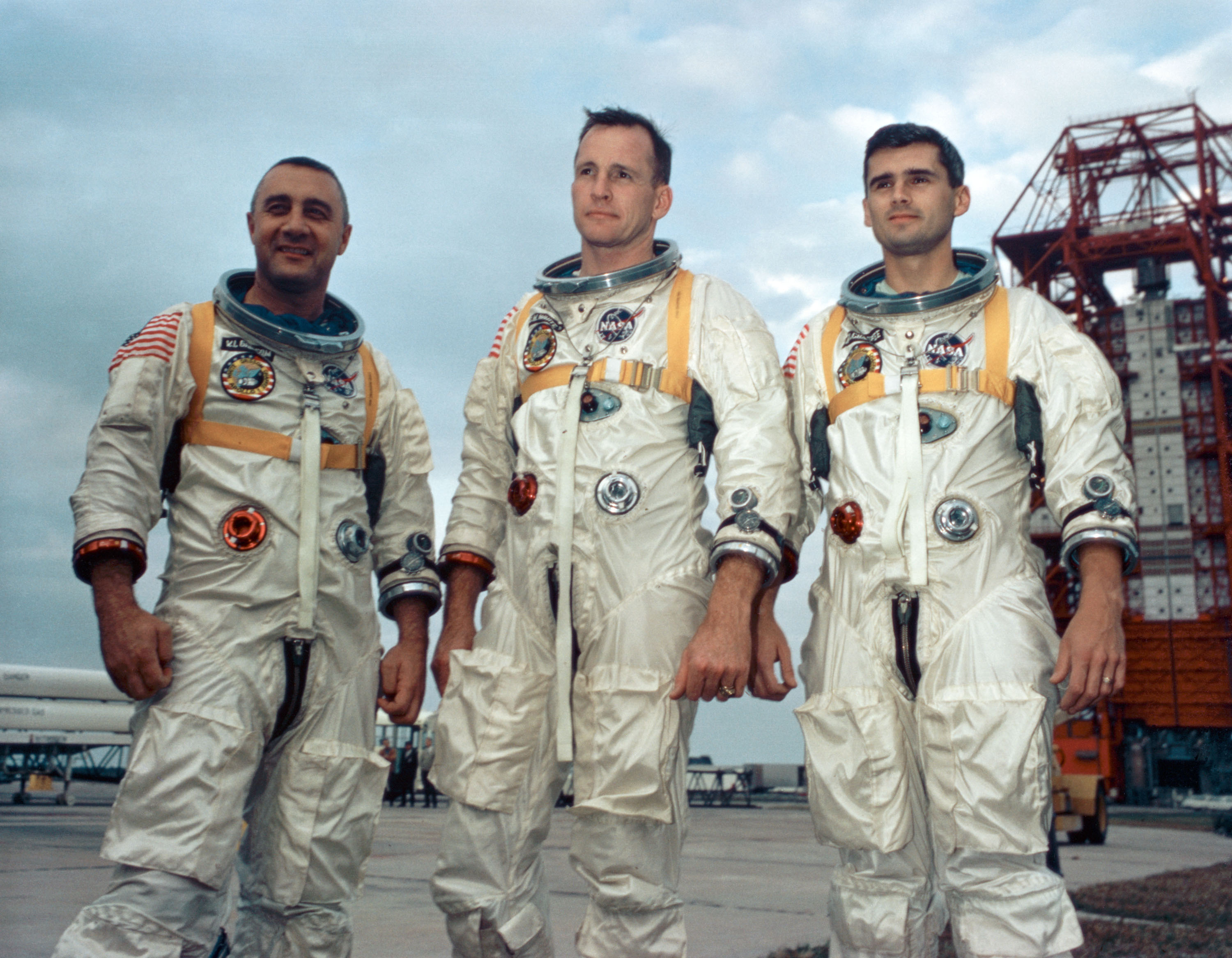 Astronauts, from the left, Gus Grissom, Ed White II and Roger Chaffee stand near Cape Kennedy's Launch Complex 34 during training for Apollo 1 in January 1967.