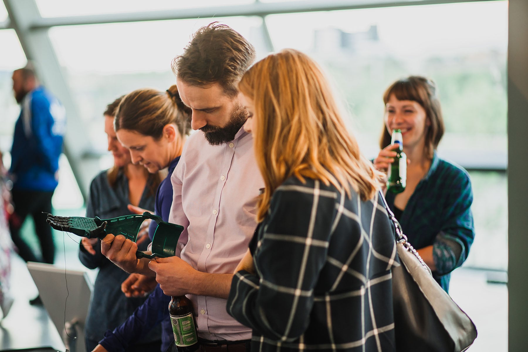 Adults enjoy exploring the meet the expert activities at Science Lates