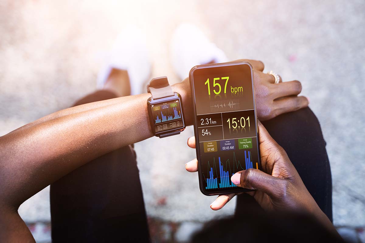 A mobile phone app and smart watch tracking health and activity.