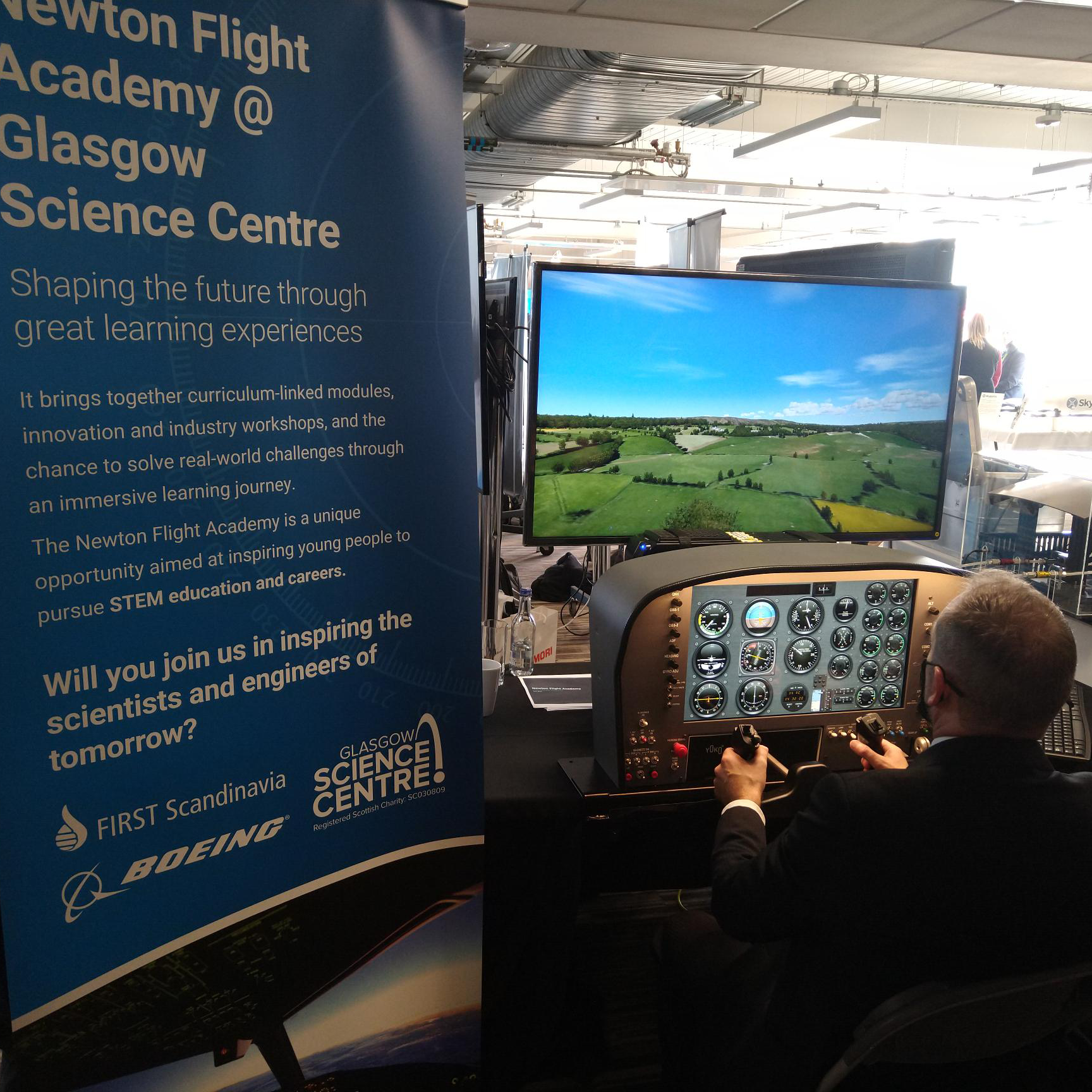 CEO, Stephen Breslin tries out a flight simulator experience at the launch of the Glasgow Newton Flight academy