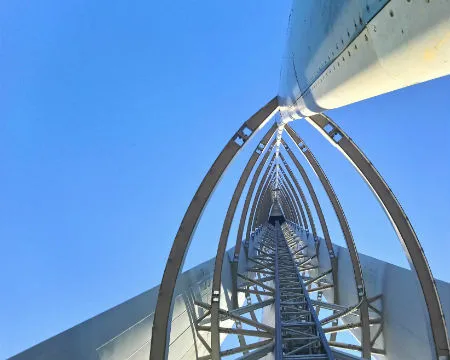 A view looking up from directly under the structure of Glasgow Tower