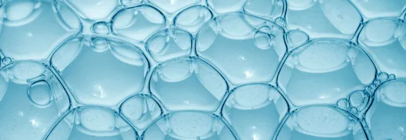 Up close abstract image of blue bubbles