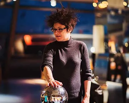 Woman using Van der Graaf generator