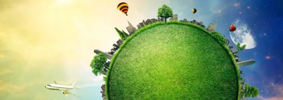 A stylised green Earth with buildings, aeroplanes and hot air balloons against a backdrop of space