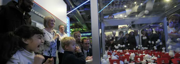 Children of all ages watching an experiment