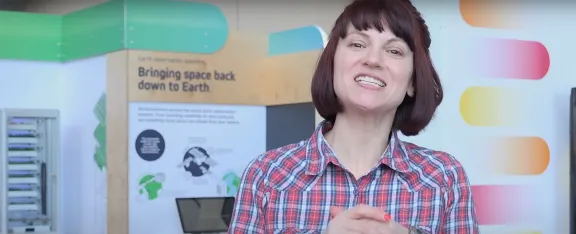 Presenter, Sheena stands in the Idea No59 exhibition