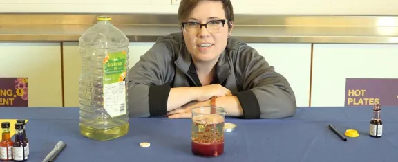 Presenter, Alicia behind a lava lamp