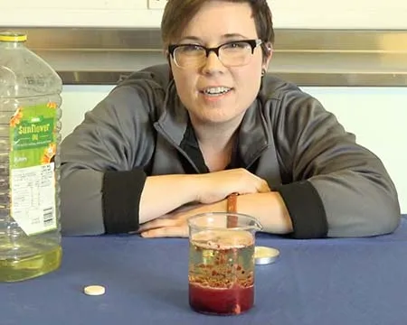 Presenter, Alicia behind a lava lamp