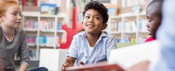 Children reading in the library
