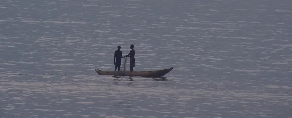 Banner image showing person on boat