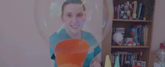 Presenter Harriet blows a large bubble