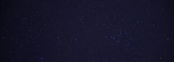 Stars over Las Vegas night sky mountains long exposure