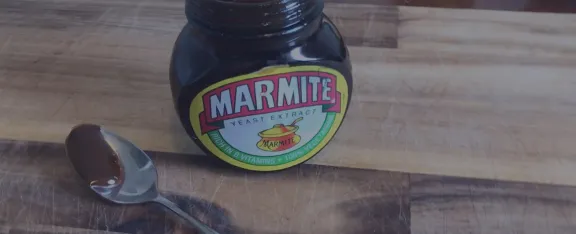A jar of marmite and a spoon