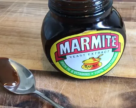 A jar of marmite and a spoon
