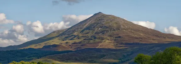 Clouds over the peak of Schiehallion (3554 ft) Viewed from Kinloch Rannoch, Perth & Kinross, Scotland