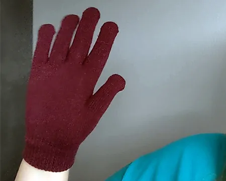 A gloved hand