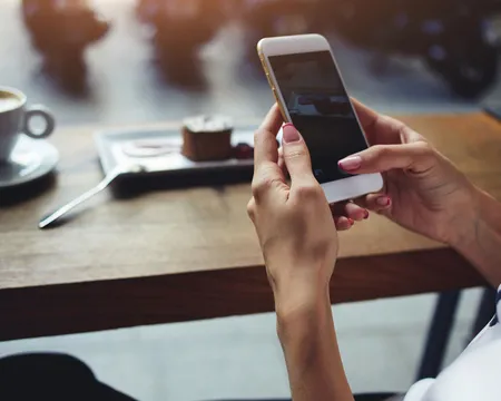 Hand holding a phone