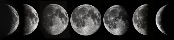The phases of the Moon - a series of photos of the Moon aligned horizontally ranging from crescent, through full, back to crescent.