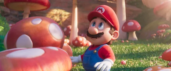 mario standing next to a toadstool 