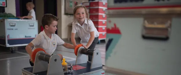 Pupils exploring electricity at interactive exhibits