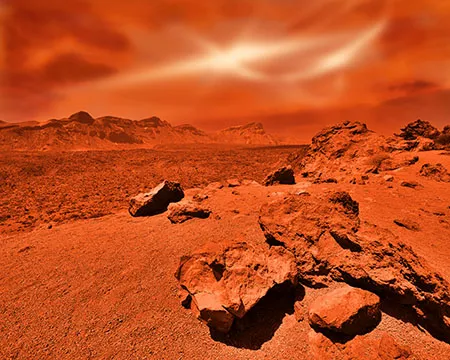 The orange, rocky surface of Mars
