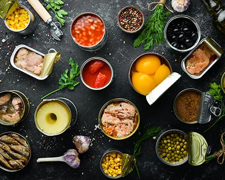 Opened tins of preserved food