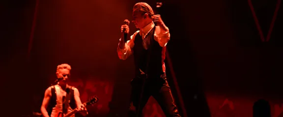 Dave Gahan and Martin Gore performing live. 