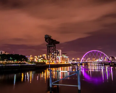 The River Clyde at night with the Clyde Arc and Finnieston Crane