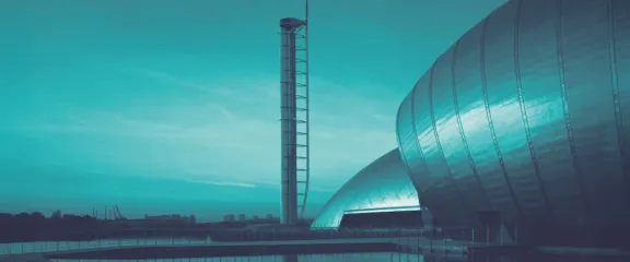 Blue-washed image of the science centre, IMAX and Glasgow Tower