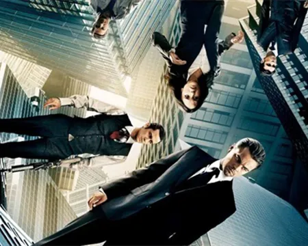 People standing on abstract buildings