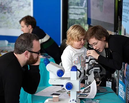 An expert shares their research with a family