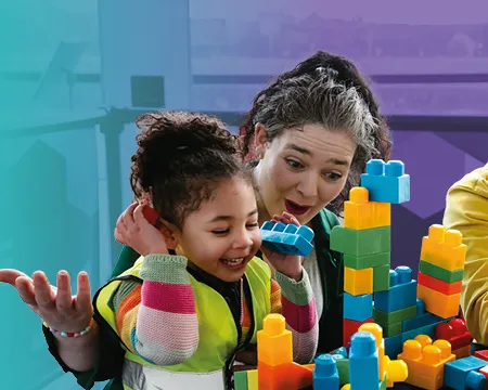 A family building with colourful blocks
