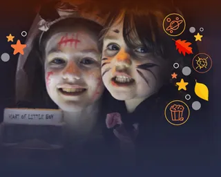 Two young girls with their faces painted