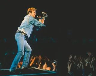 George Michael singing on stage 