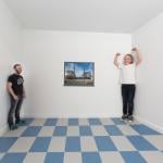 Dad and daughter explore the Ames room 