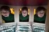 Boy playing with the infinity mirror