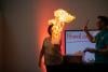 Another visitor tries Hand on Fire