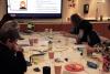 A community group draw and paint their contributions to the Almanack