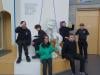 a group pose in front of the science centre's homunculous